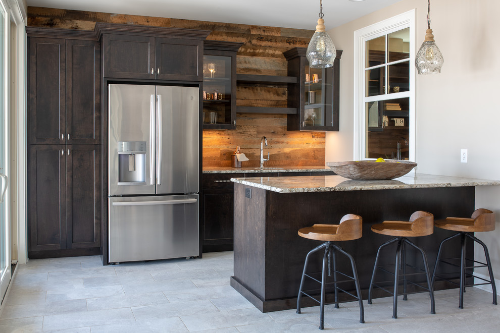 Photo of a country single-wall wet bar in Minneapolis with shaker cabinets, dark wood cabinets, brown splashback, timber splashback, grey floor and grey benchtop.