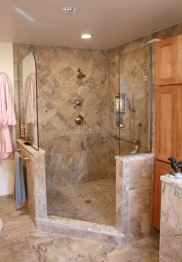 Photo of a mid-sized transitional master bathroom in Philadelphia with an undermount sink, shaker cabinets, light wood cabinets, engineered quartz benchtops, a corner shower, a two-piece toilet, multi-coloured tile, porcelain tile, beige walls and porcelain floors.