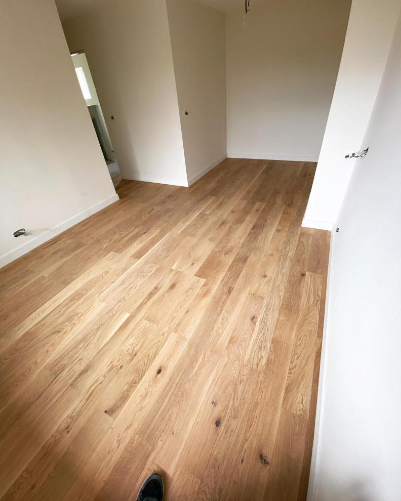 Pose d’un parquet collé en lame