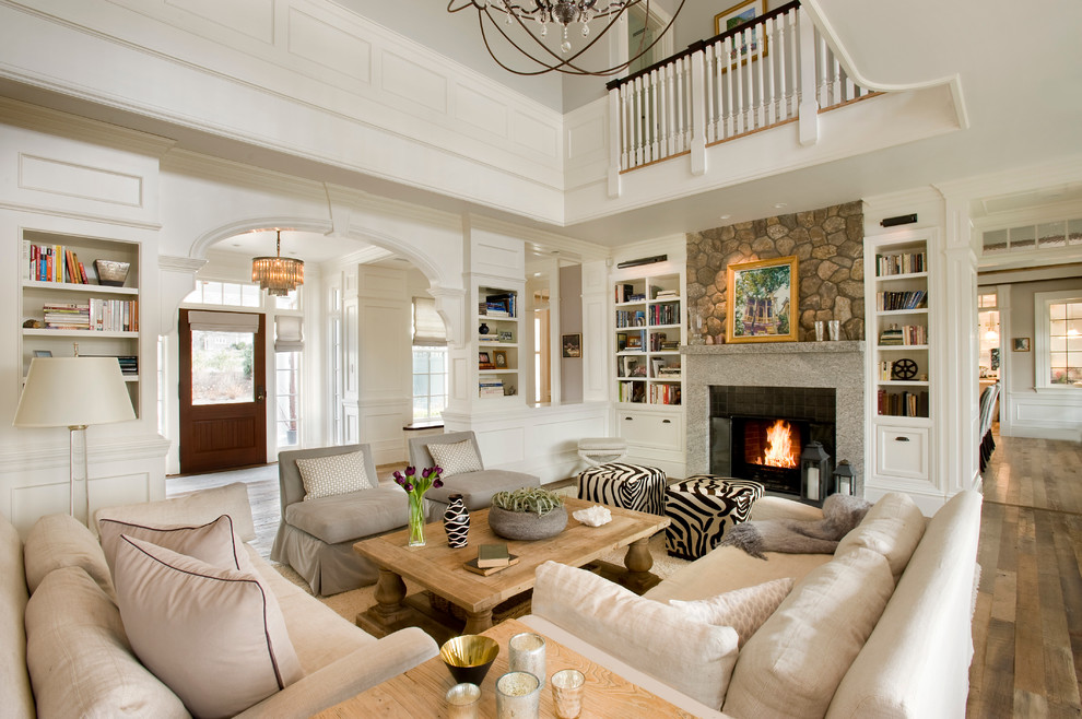 Traditional open concept living room in Boston with white walls, dark hardwood floors, a standard fireplace, a tile fireplace surround and no tv.
