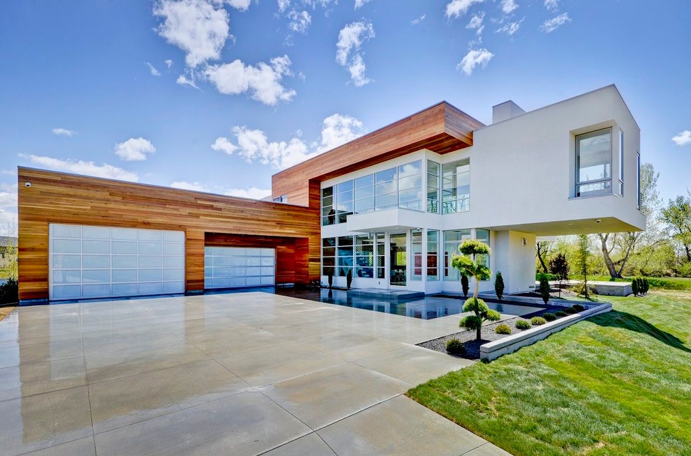 Photo of a contemporary exterior in Boise with wood siding.