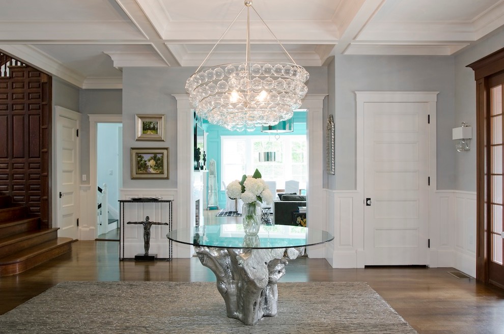 Foyer - large transitional dark wood floor foyer idea in Boston with gray walls and a dark wood front door