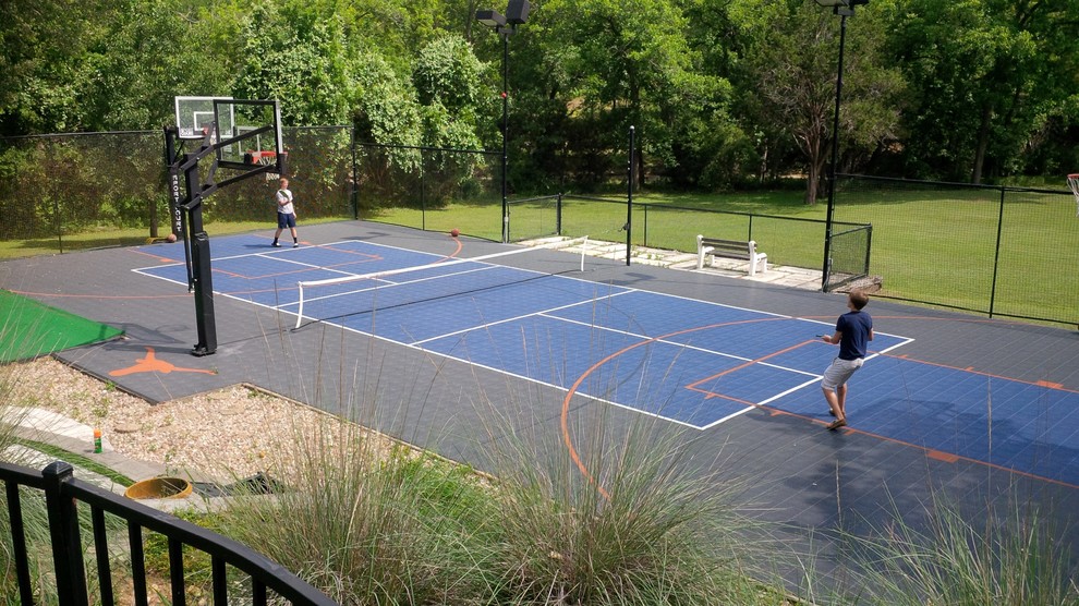 Inspiration for a large traditional backyard partial sun outdoor sport court in Austin.