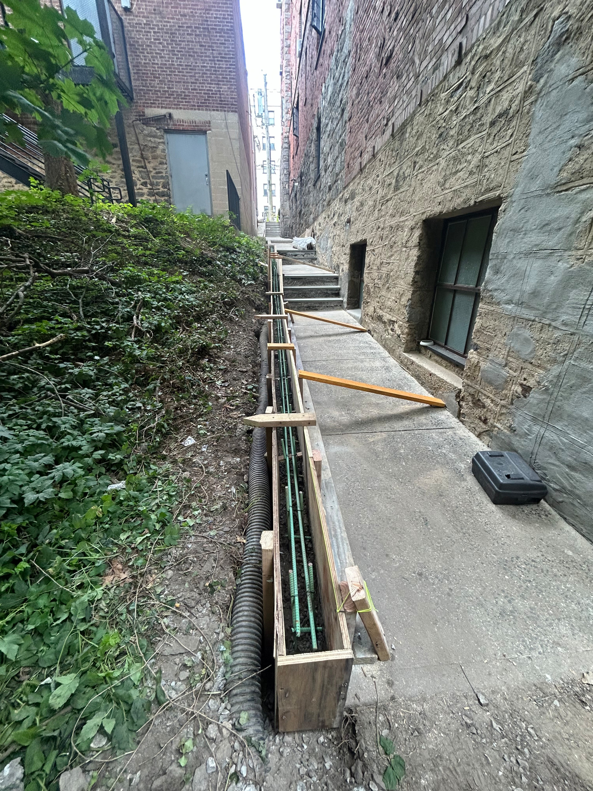 Curb/Exterior Wall Stucco/ParaPro Flashing/Garage slab replacement/Drainage