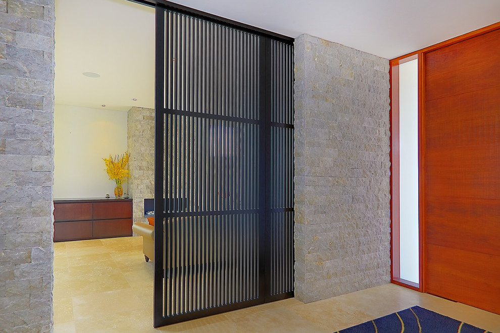 Inspiration for a contemporary entryway in Sydney with a medium wood front door.