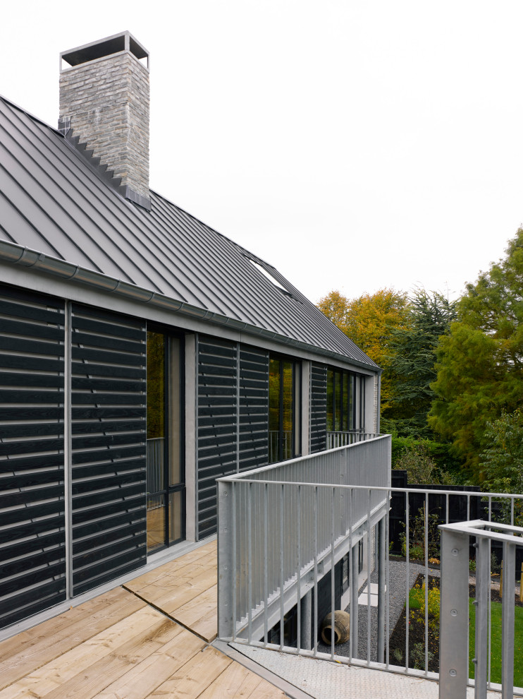 This is an example of a large classic metal railing balcony in Other.