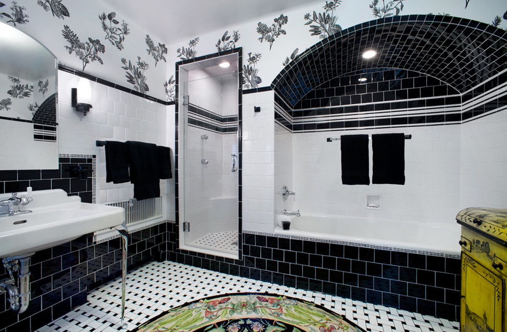 Inspiration for a mid-sized eclectic master bathroom in Denver with white cabinets, an alcove shower, black and white tile, subway tile, multi-coloured walls, ceramic floors, a wall-mount sink, multi-coloured floor, an open shower and white benchtops.