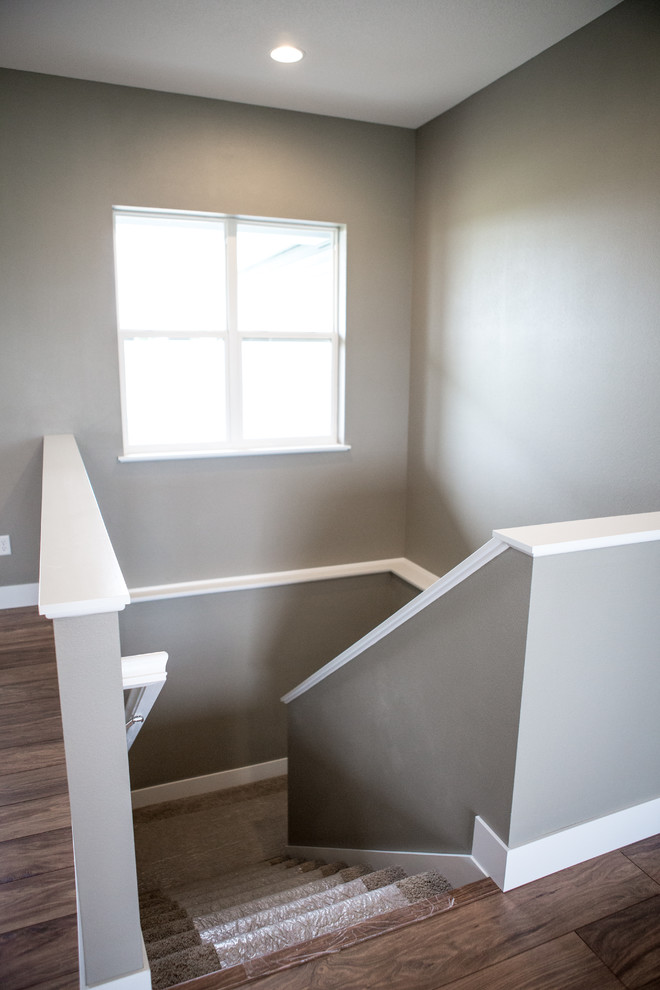 Transitional staircase photo in Cedar Rapids