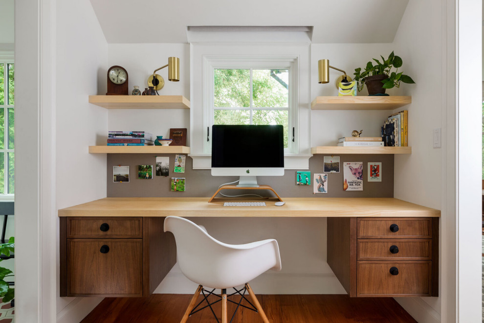Example of a 1960s home office design in Denver