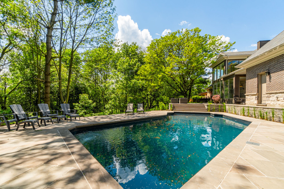 Design ideas for a traditional pool in Toronto.