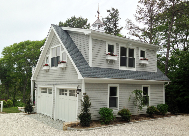 This is an example of a mid-sized traditional detached two-car garage in Boston.