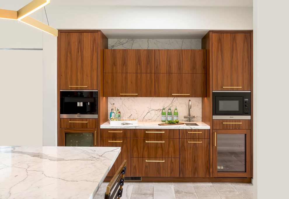 Design ideas for a large midcentury l-shaped eat-in kitchen in San Diego with an undermount sink, flat-panel cabinets, brown cabinets, marble benchtops, white splashback, stone slab splashback, panelled appliances, porcelain floors and with island.