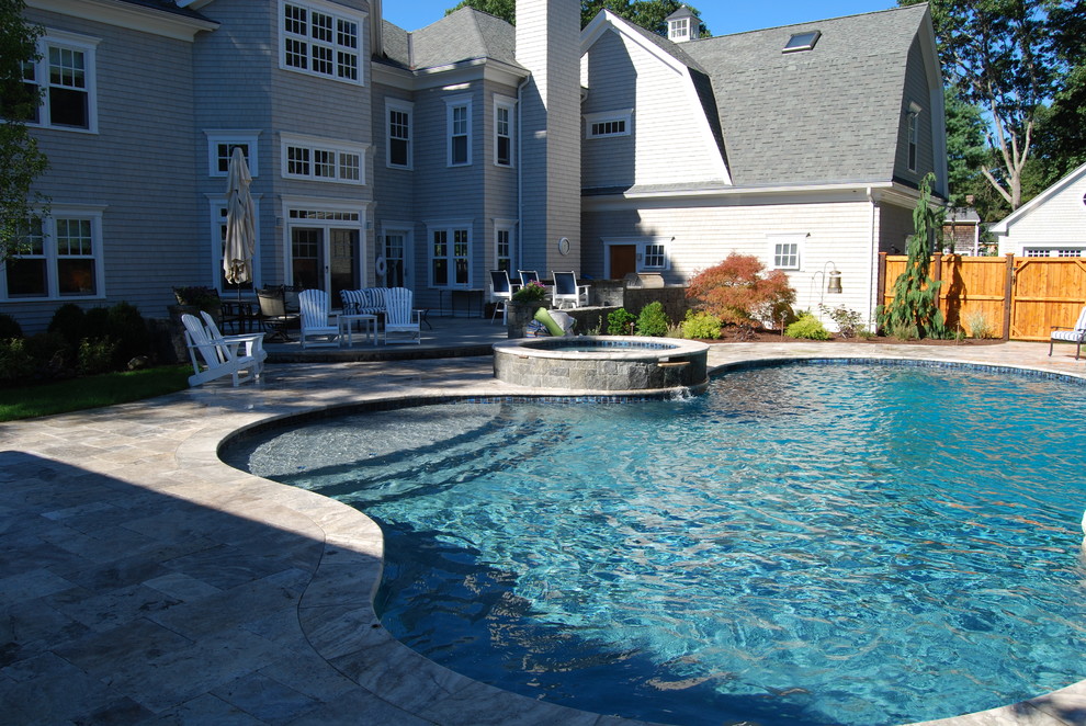 Water slide - mid-sized rustic backyard stone and kidney-shaped natural water slide idea in Boston