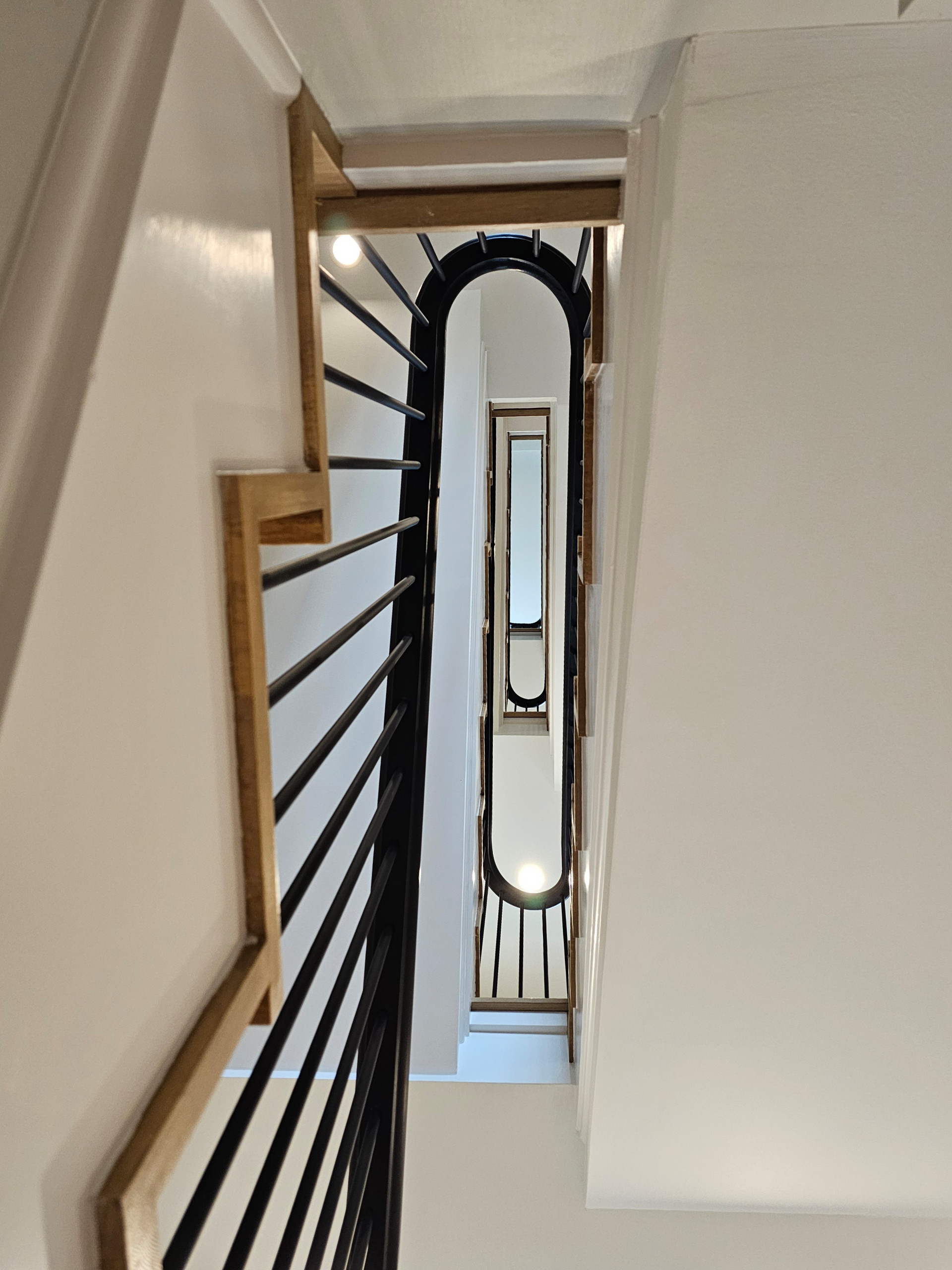 115_Stunning Continuous Rail System on 3 Story Floating Stairs; Arlington, VA 22