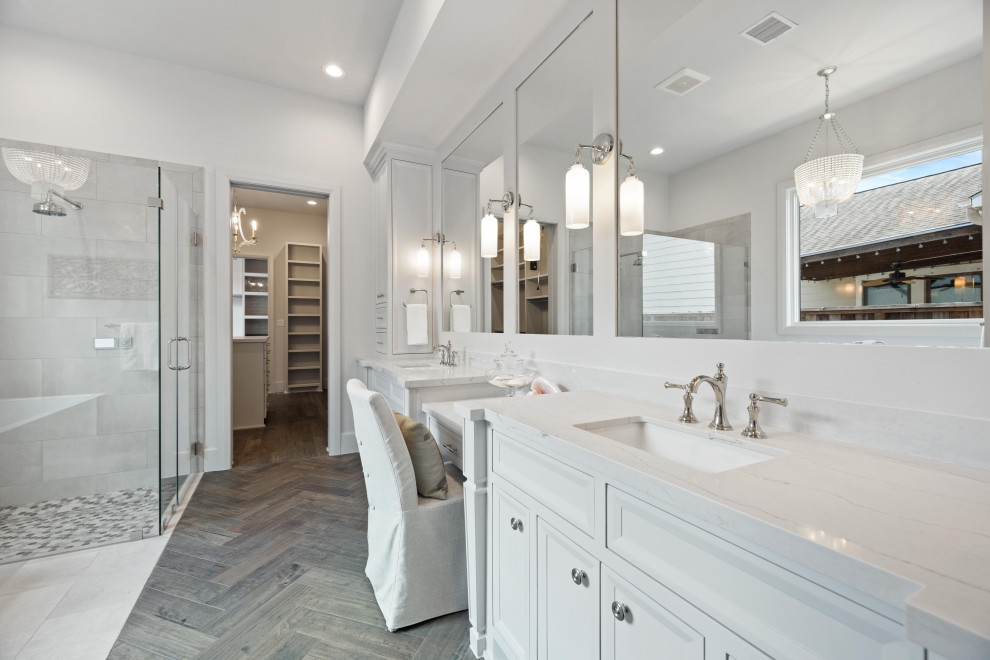Photo of an expansive traditional master bathroom in Houston with recessed-panel cabinets, white cabinets, a freestanding tub, engineered quartz benchtops, white benchtops, a double vanity and a built-in vanity.