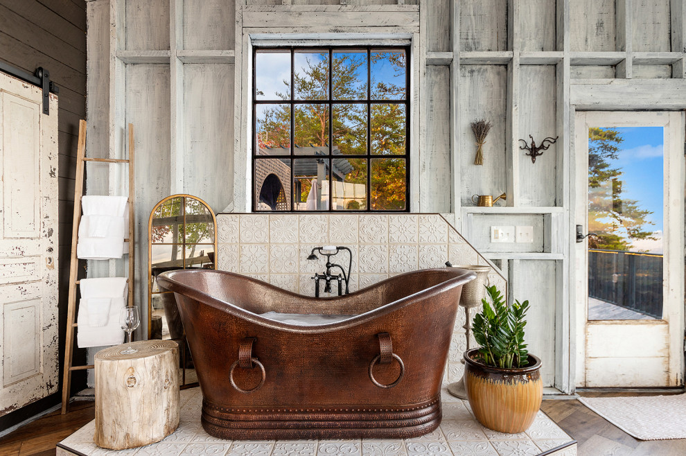 Country bathroom in Phoenix with a freestanding tub.