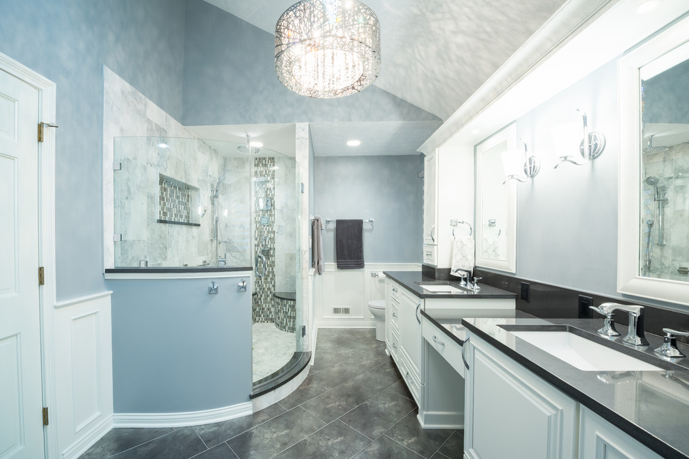 Inspiration for a mid-sized eclectic master black and white tile and ceramic tile ceramic tile wet room remodel in Indianapolis with raised-panel cabinets, white cabinets, a two-piece toilet, blue walls, an undermount sink and quartzite countertops
