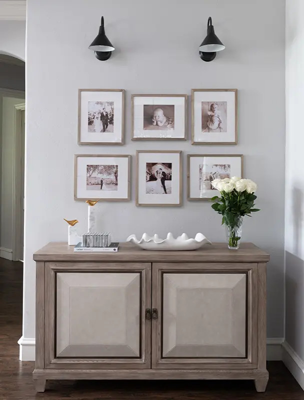 Transitional dark wood floor and brown floor entryway photo in Dallas with gray walls