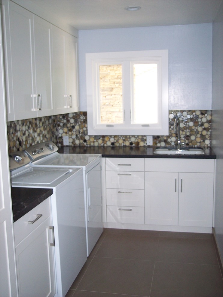 This is an example of a transitional laundry room in San Francisco.
