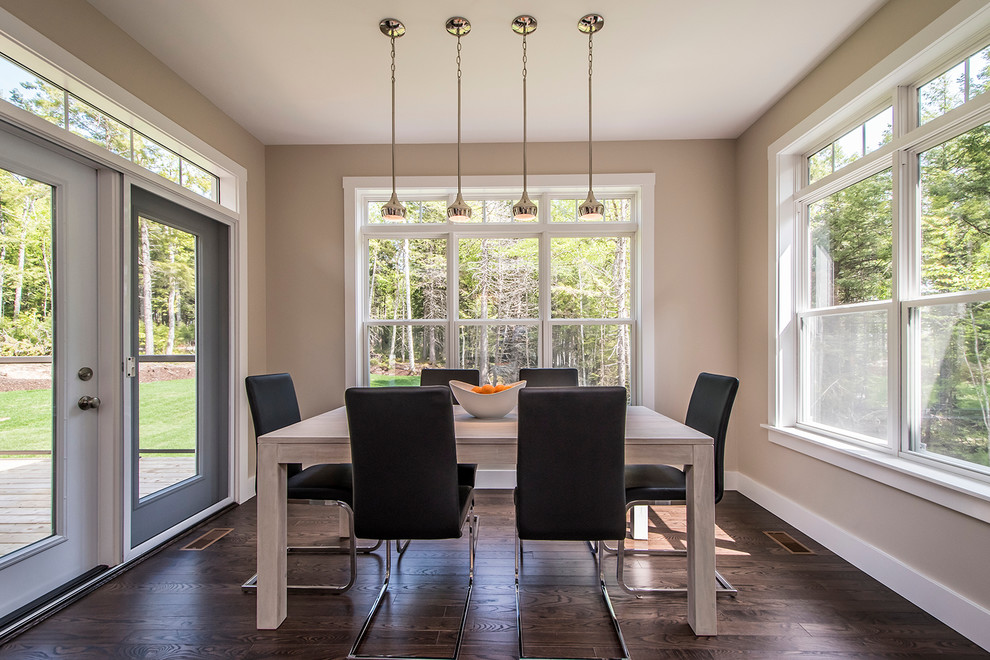 Enclosed dining room - mid-sized transitional dark wood floor and brown floor enclosed dining room idea with beige walls and no fireplace