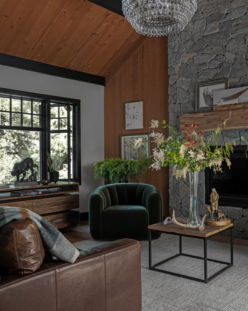 Inspiration for a large transitional exposed beam, vaulted ceiling, wood ceiling, wood wall, medium tone wood floor and brown floor living room remodel in San Francisco with white walls, a standard fireplace and a stone fireplace