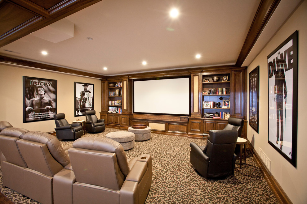 Expansive traditional enclosed home theatre in Cincinnati with yellow walls, carpet and a projector screen.