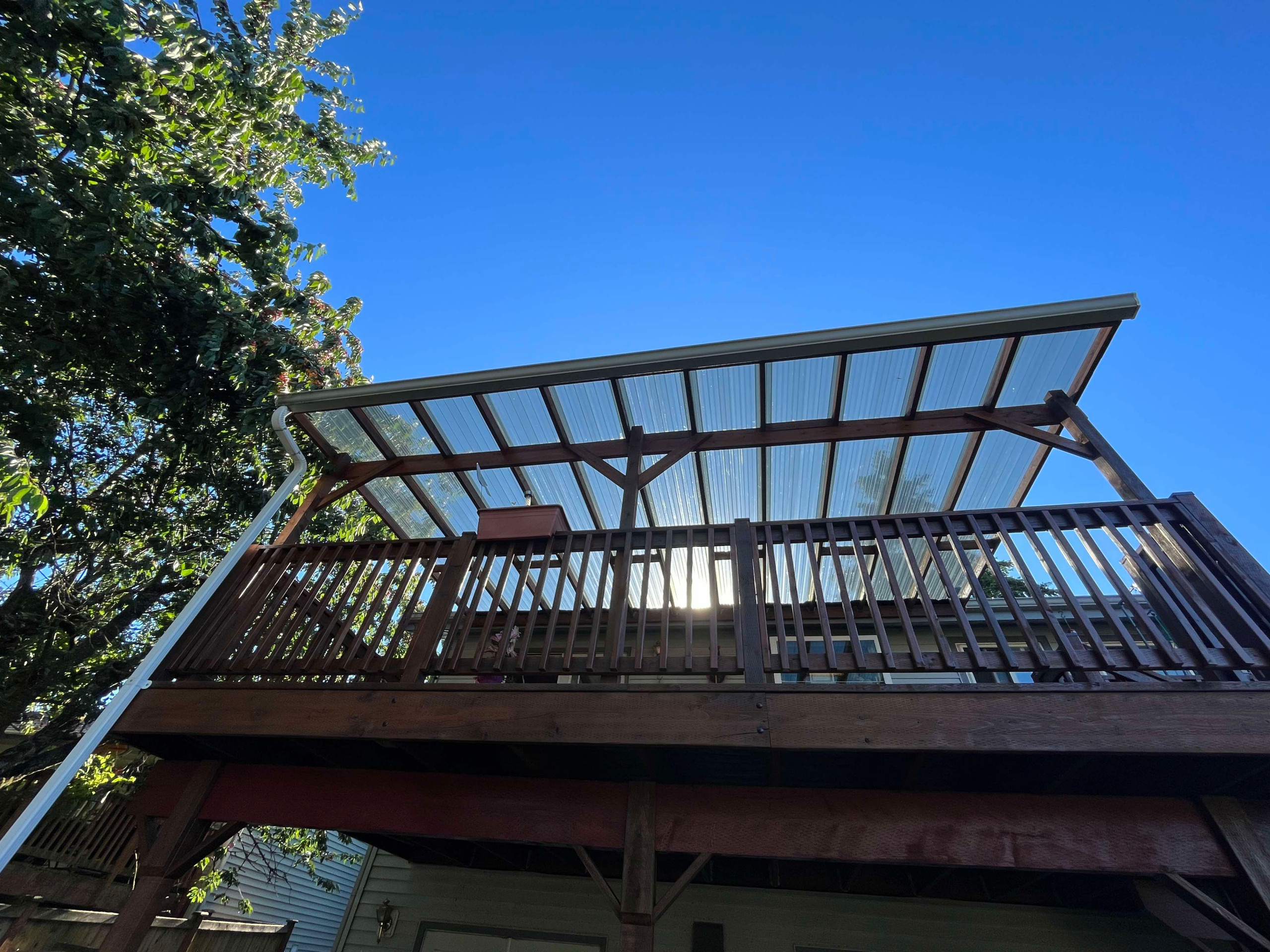 Deck Reconstruction, Stain & Roof Build