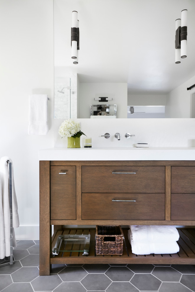 Large contemporary master bathroom in San Francisco with flat-panel cabinets, medium wood cabinets, a freestanding tub, an open shower, white walls, ceramic floors and a drop-in sink.
