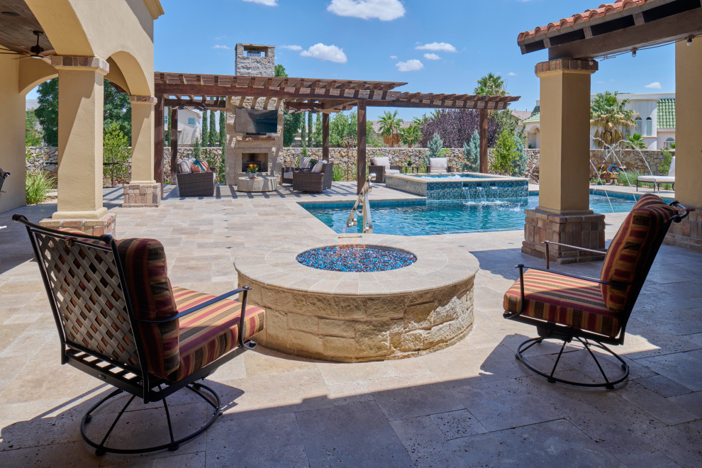This is an example of a mid-sized mediterranean backyard rectangular natural pool in Other with with a pool and natural stone pavers.