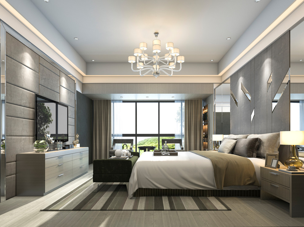 This is an example of a large contemporary master bedroom in Los Angeles with grey walls, dark hardwood floors and grey floor.