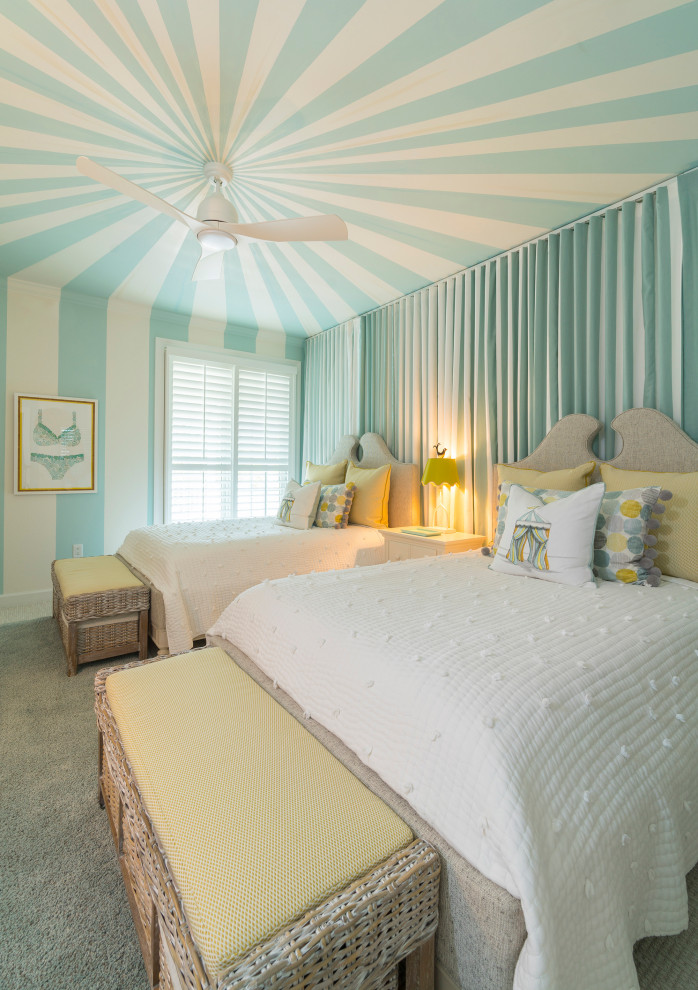 This is an example of a beach style bedroom in Baltimore with blue walls, carpet, grey floor, wallpaper and wallpaper.