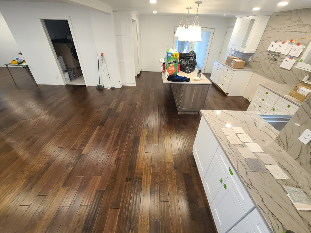 Sleek Engineered Hardwood & Modern Sliding Door by I’m The Man Services