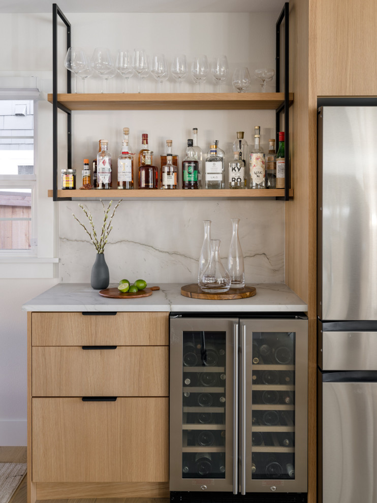 Dry bar - small contemporary single-wall light wood floor and beige floor dry bar idea in Seattle with no sink, flat-panel cabinets, light wood cabinets, quartzite countertops, gray backsplash, stone slab backsplash and gray countertops