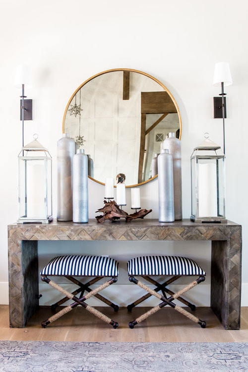 Example of a mid-sized transitional light wood floor and beige floor foyer design in Phoenix with white walls