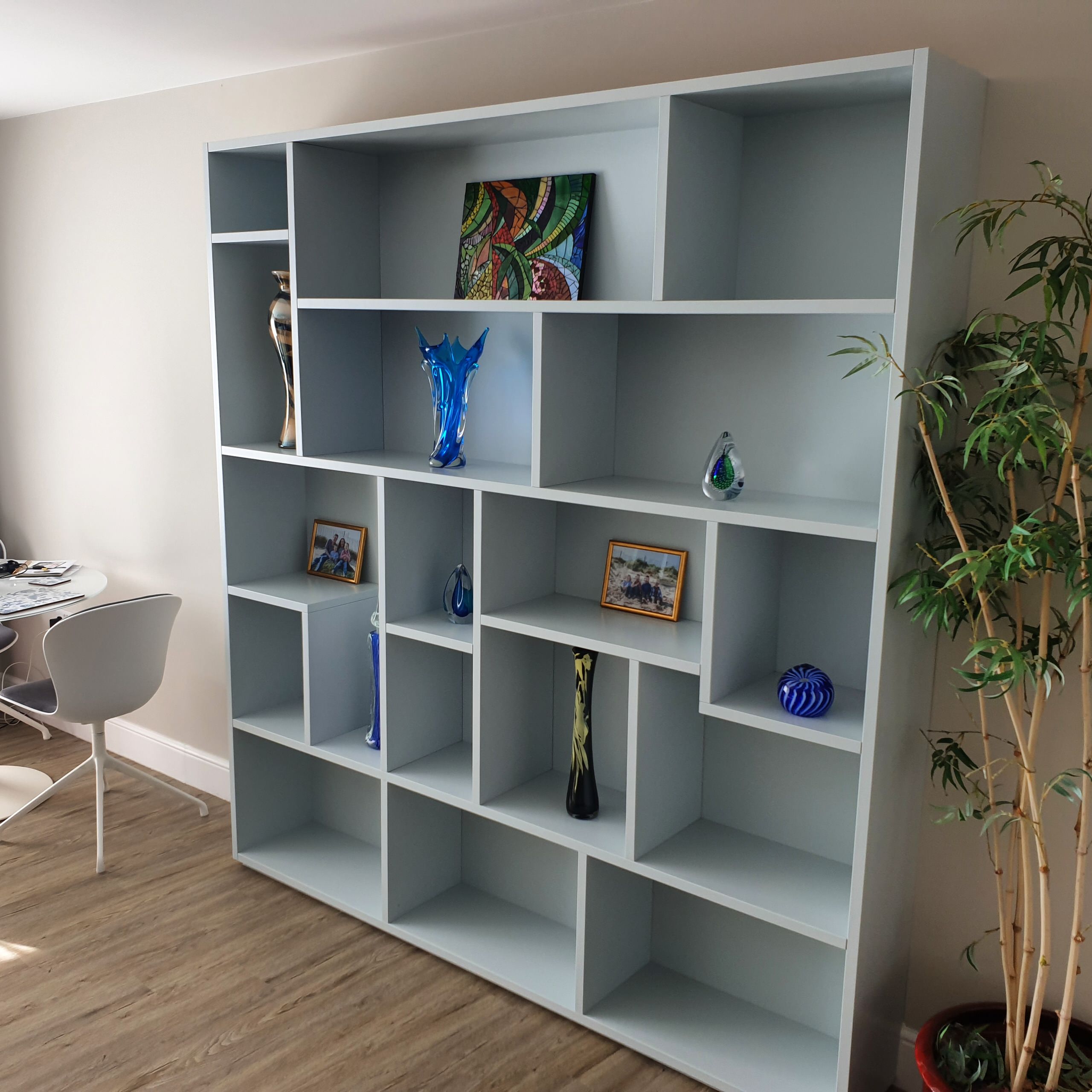 Light blue freestanding display cabinet