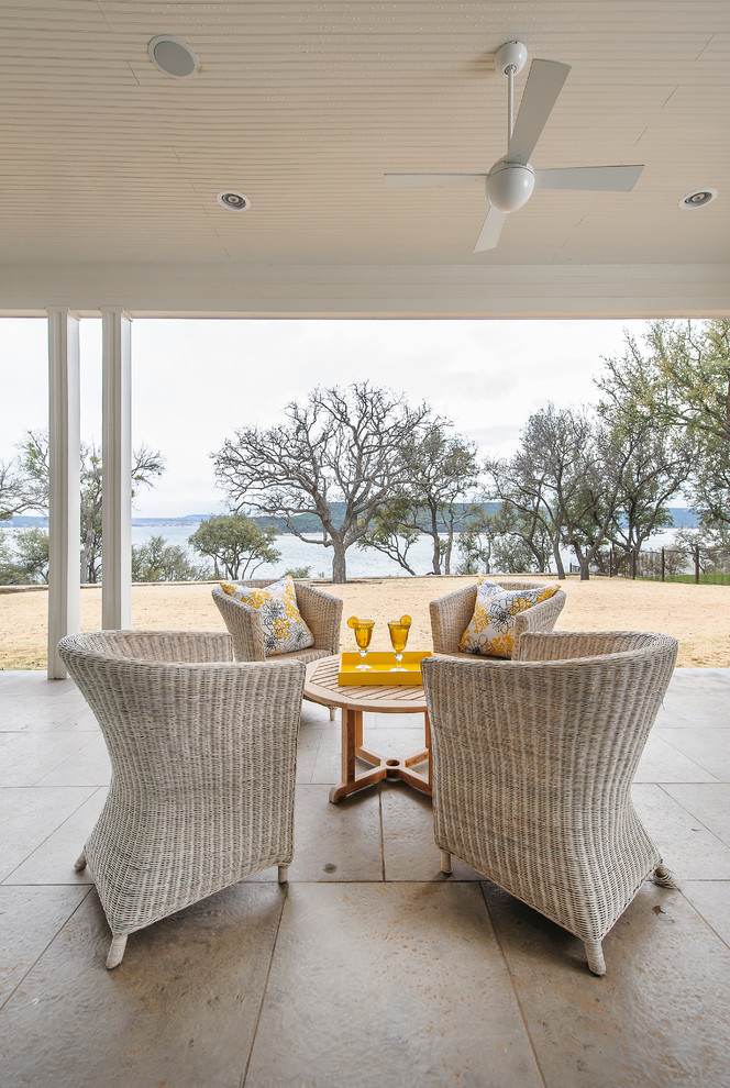 Transitional patio photo in Dallas with a roof extension