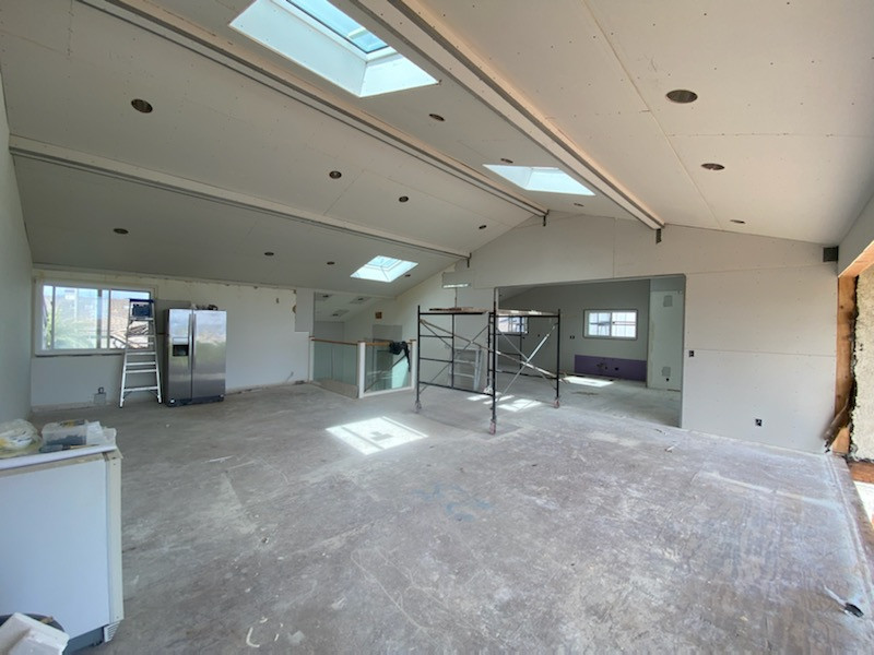 Vaulted ceiling skylights, folding door front doors