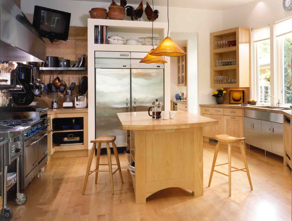 Photo of an eclectic kitchen in Minneapolis with stainless steel appliances.