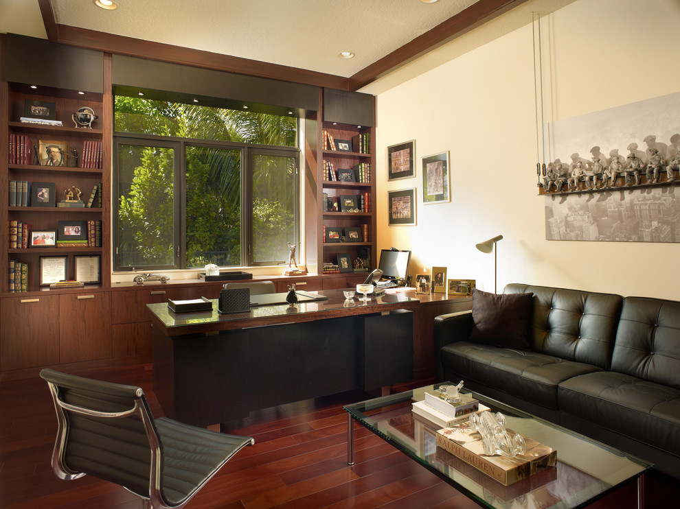 Photo of a contemporary home office in Detroit with white walls.