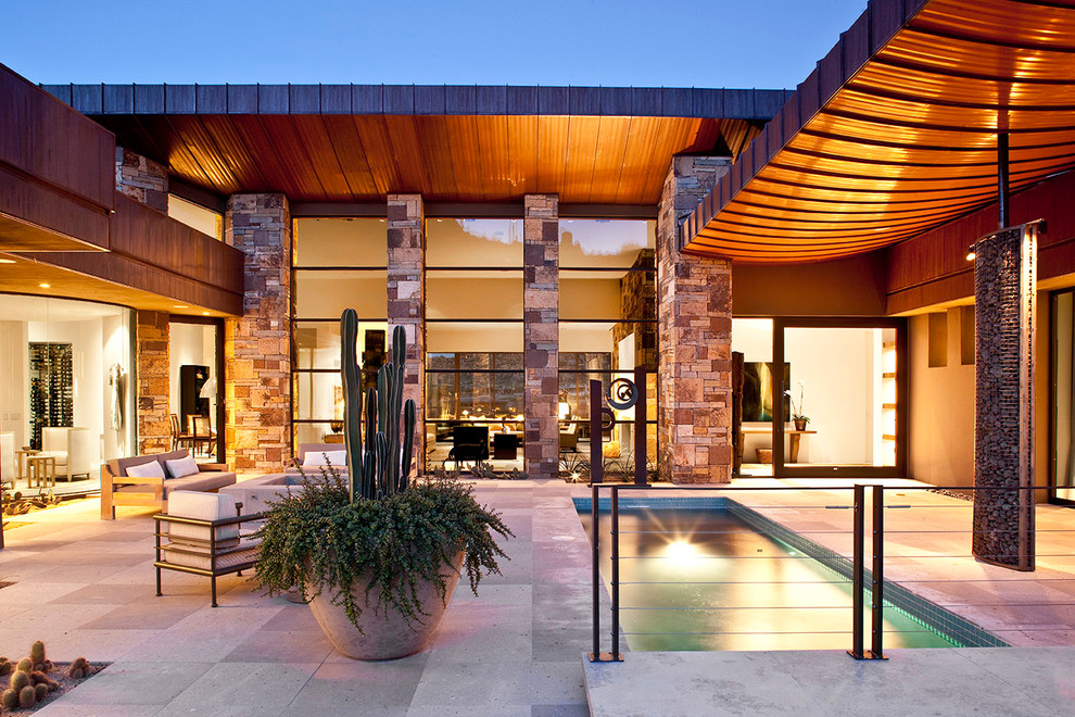 Inspiration for an expansive modern exterior in Phoenix.