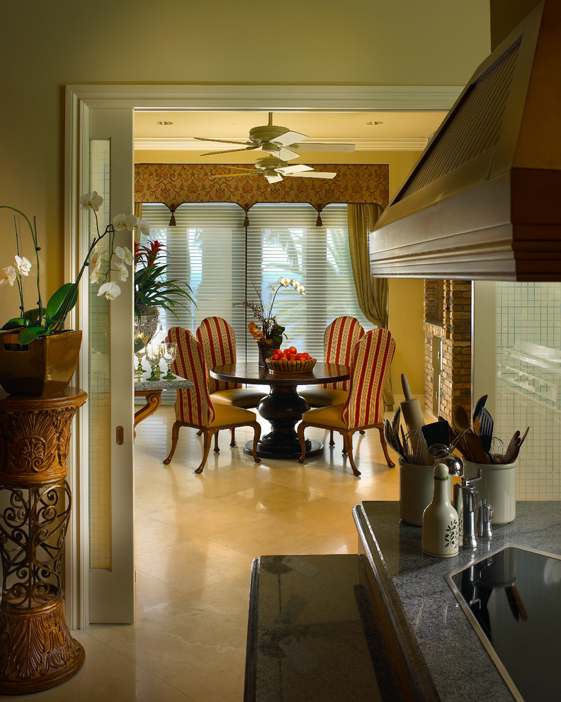 Photo of a mediterranean dining room in Miami.
