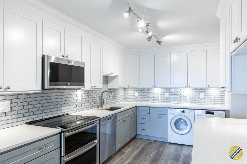 Mid-sized transitional beige floor kitchen photo in DC Metro with white cabinets, gray backsplash, ceramic backsplash, stainless steel appliances, no island and white countertops