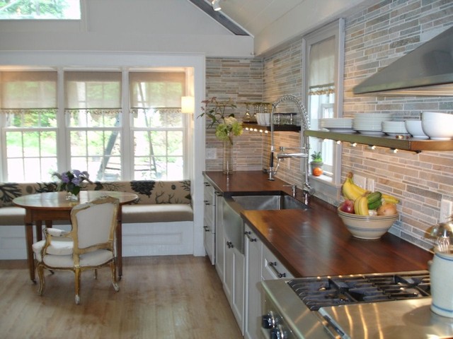 Cozy Kitchen Gathering Room With Custom Wood Countertops