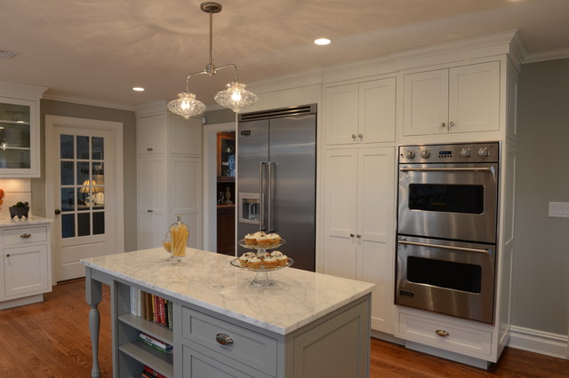 Flat Panel White Paint Flush Inset Cabinetry With Gorgeous Marble