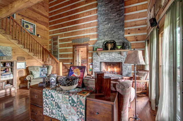 Cabin on a Hill Interior rustic-living-room