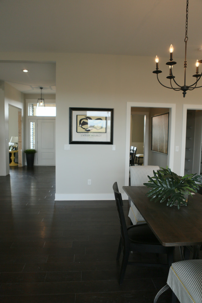 Inspiration for a large transitional open concept dark wood floor home design remodel in Chicago with gray walls, a standard fireplace and a brick fireplace
