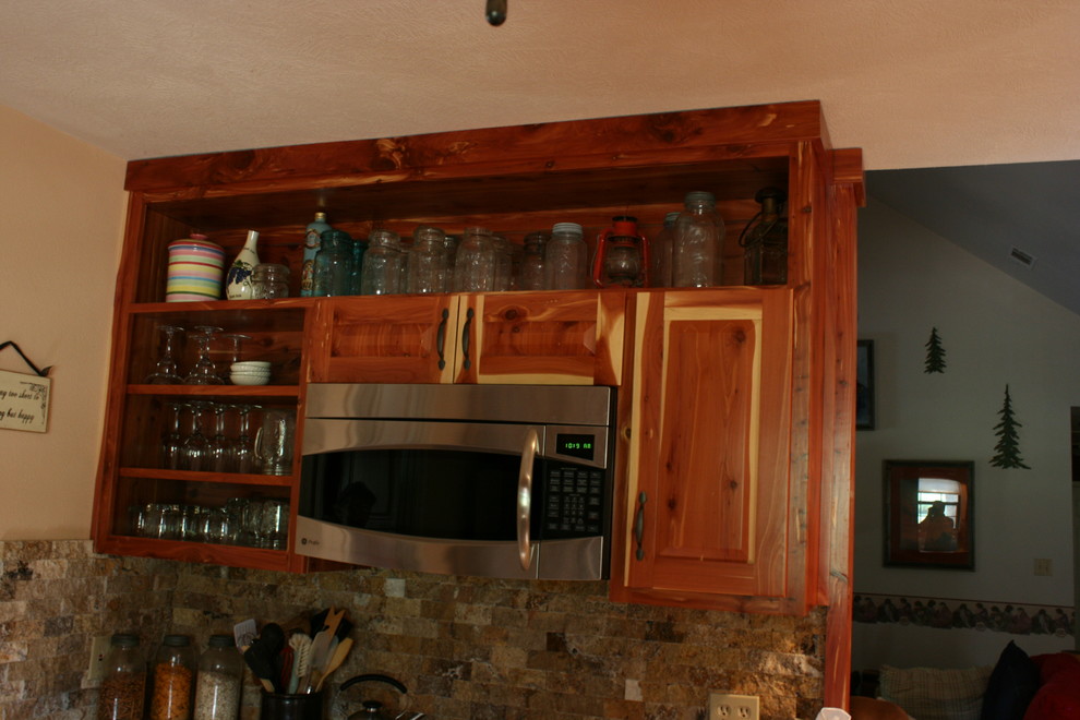 Example of a mountain style kitchen design in Austin