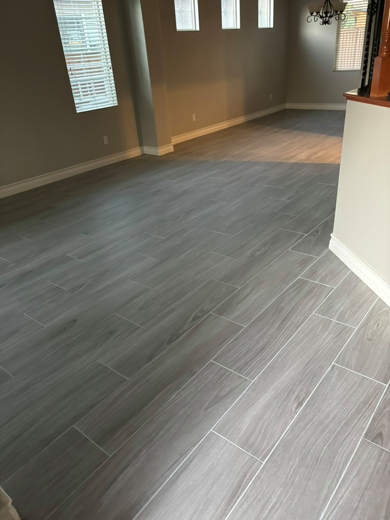 Tile plank install / laundry room cabinetry