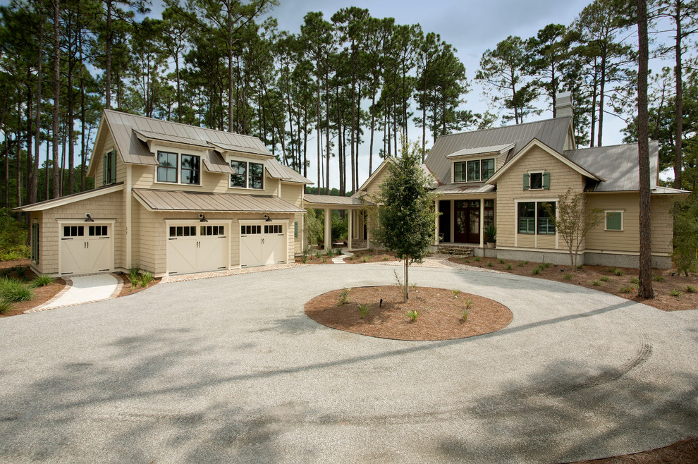 Mid-sized beach style two-storey beige exterior in Atlanta with mixed siding and a gable roof.