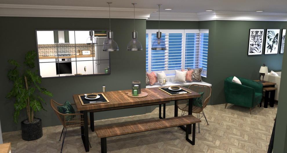Ejemplo de comedor minimalista abierto con paredes verdes, suelo laminado y suelo beige